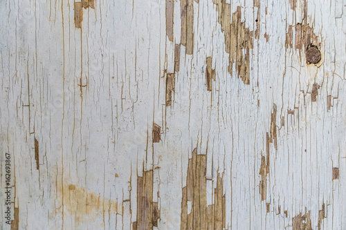 Chipped paint on the side of a building