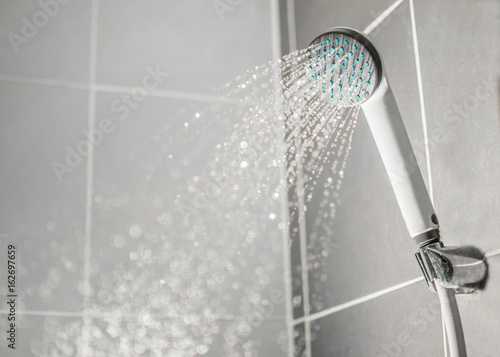 Droplets flowing from shower