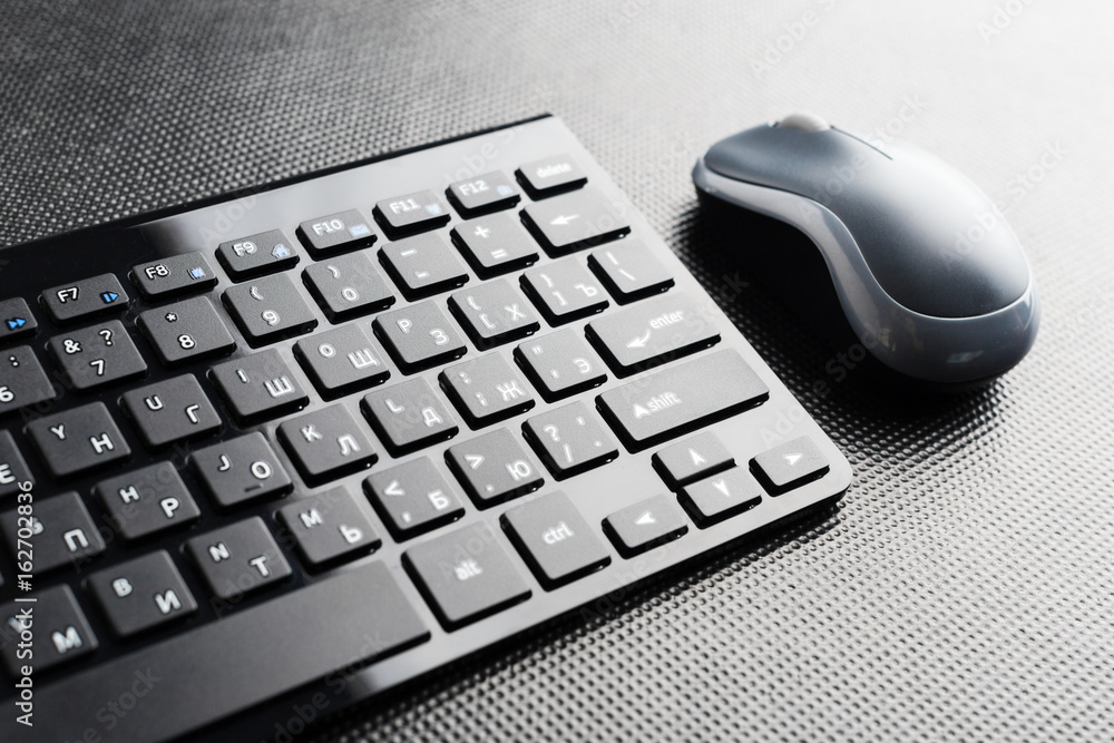 keyboard and mouse on the table . keyboard and mouse on the table .