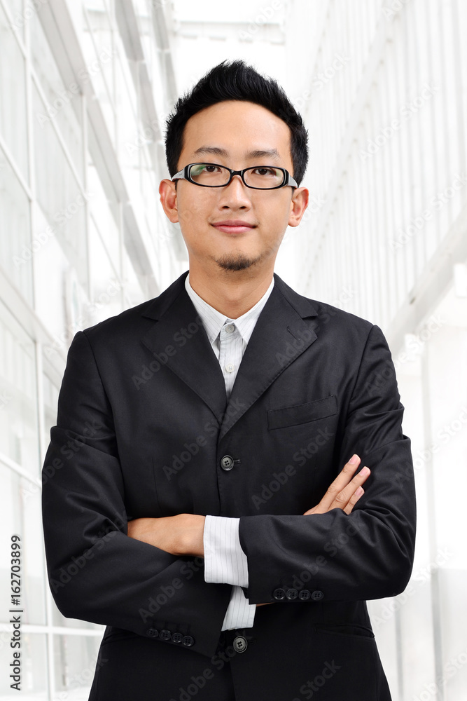 Confident Asian businessman Confident Asian businessman