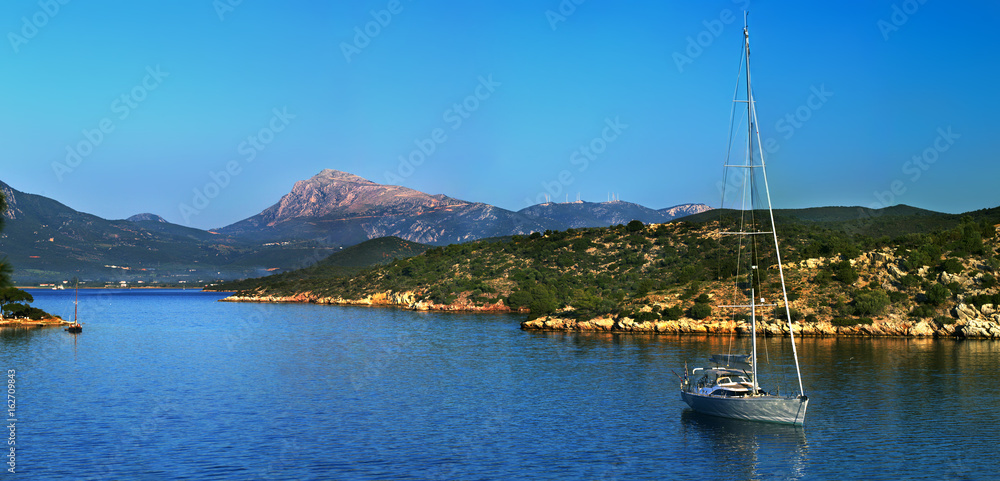 'Abandon all cares': Morning in the small cove on Poros isalnd