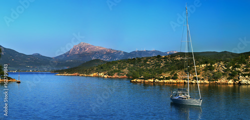 'Abandon all cares': Morning in the small cove on Poros isalnd