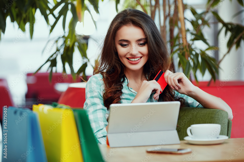 Attractive girl shopping online Attractive girl shopping online