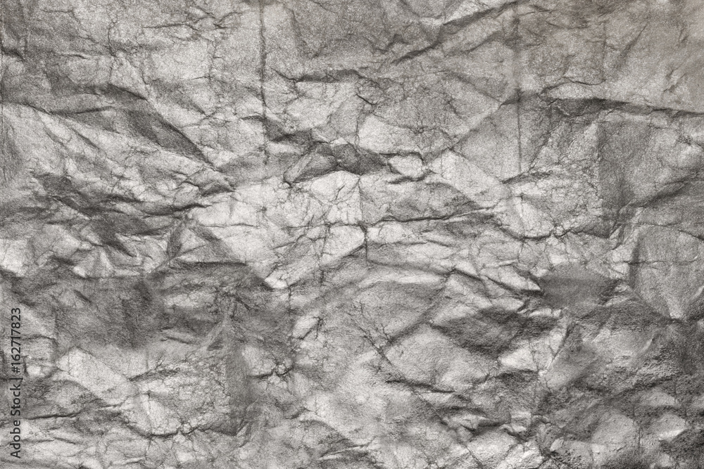 Crumpled silver paper, texture background Crumpled silver paper, texture background