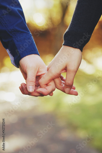 couple hand holding