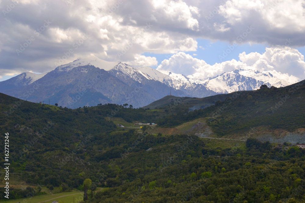 Fototapeta premium Beautiful highland landscape. Mountains, woods and sky