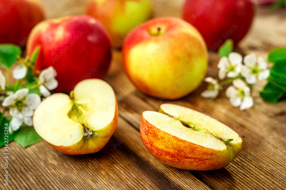 Raw organic apples on wooden background Raw organic apples on wooden background