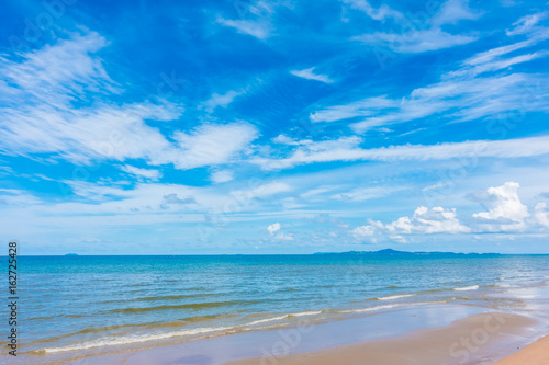 Beautiful beach with sea and ocean on blue sky