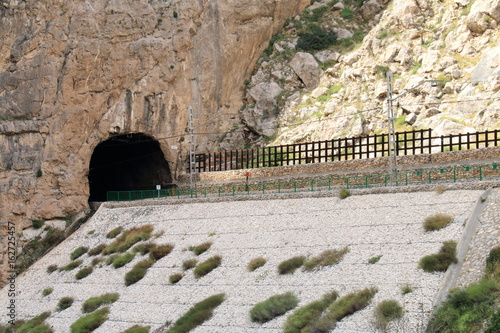 Tunnel crossing the mountain in Caminito del Rey, Malaga, Spain