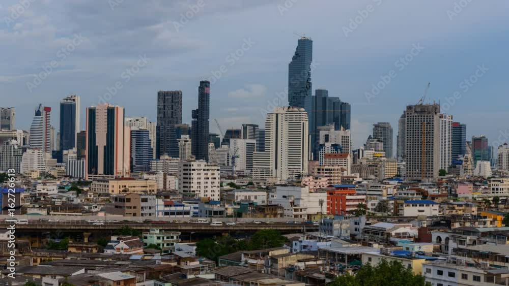 Time lapse Day to night of high view of city and blur traffic light Time lapse Day to night of high view of city and blur traffic light