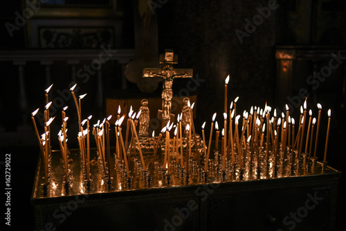 Fototapeta Candles in Orthodox church, praying candles.