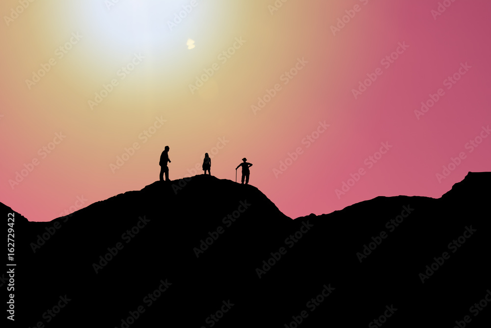 Fototapeta Silhouettes of people on mountains- Stock Image