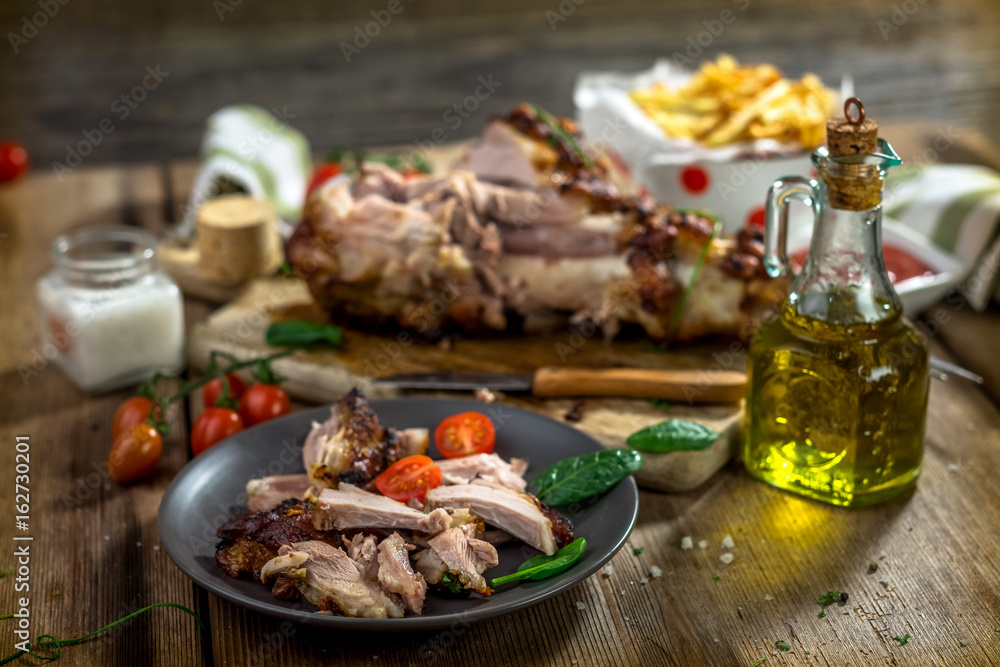 Roasted pork knuckle with french fries Roasted pork knuckle with french fries