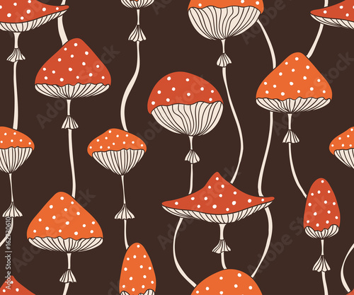 Vector seamless pattern with cute red fly-agaric amanita mushrooms. Doodle style wallpaper or fabric design.