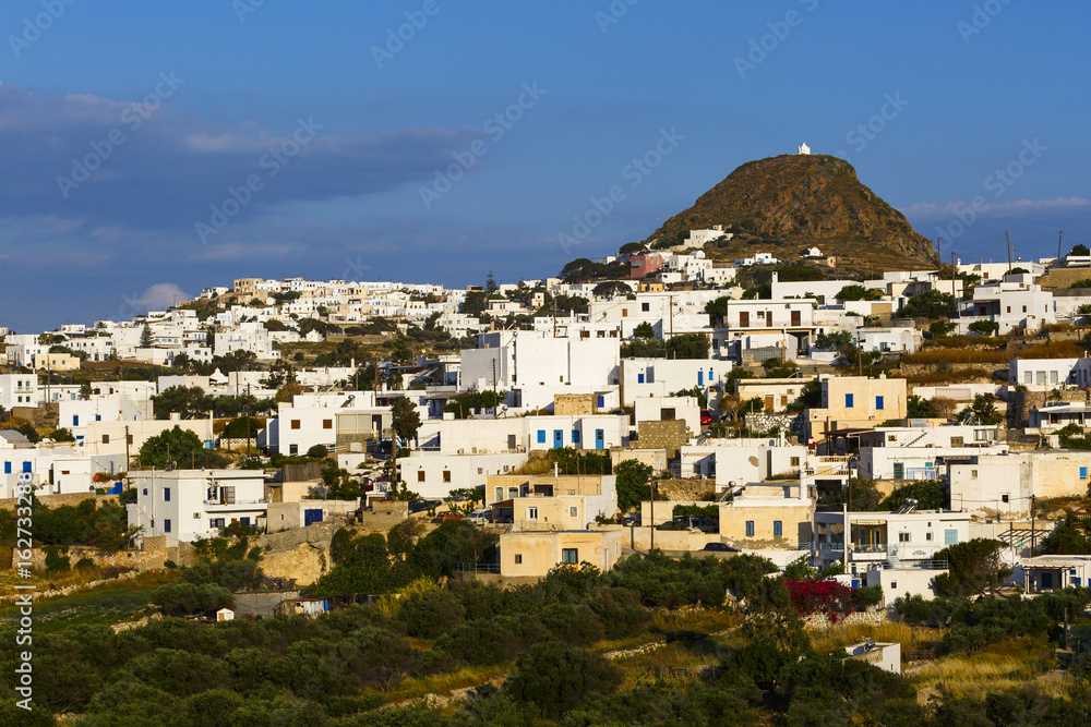 Triovasalos village and castle hill on Milos island in Greece.
