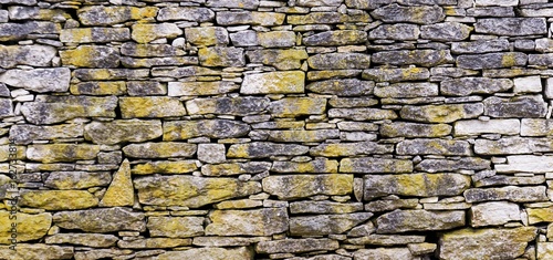 rock wall background masonry historic row masonry in Kentucky style developed by slaves in Bluegrass region  photo