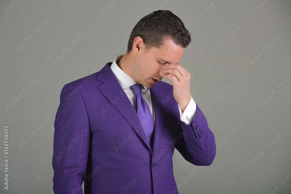 Stress and problems of businessman with headache and stylish hair Stress and problems of businessman with headache and stylish hair