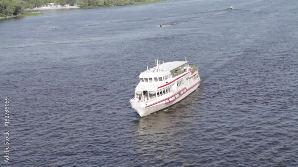 passenger ship floating on the river. excursions by boat on the river passenger ship floating on the river. excursions by boat on the river
