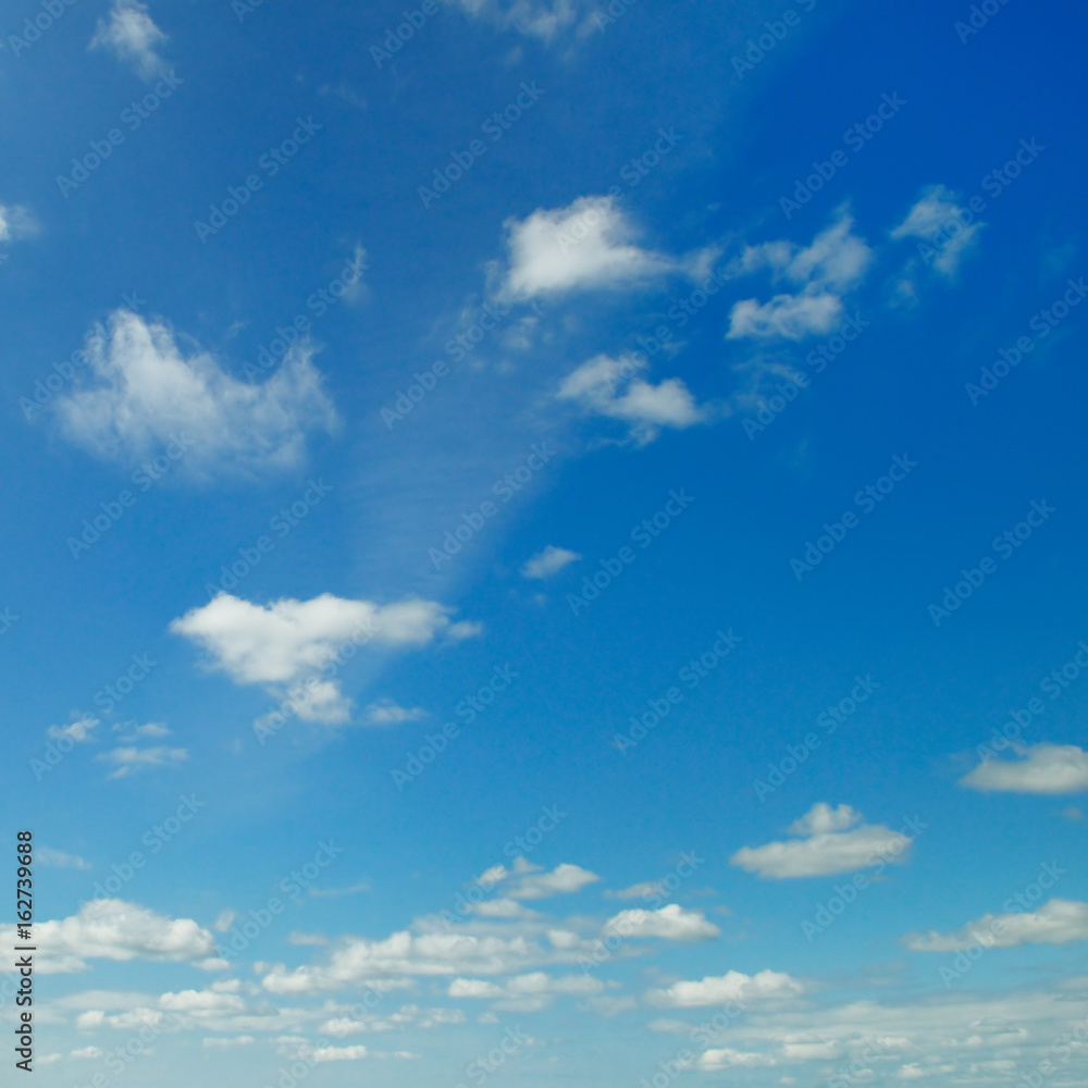 blue sky and cumulus clouds