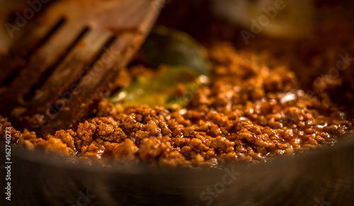 Photos Bolognese sauce in a  pan