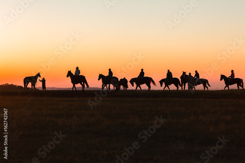 Horses Riders Silhouetted Dawn
