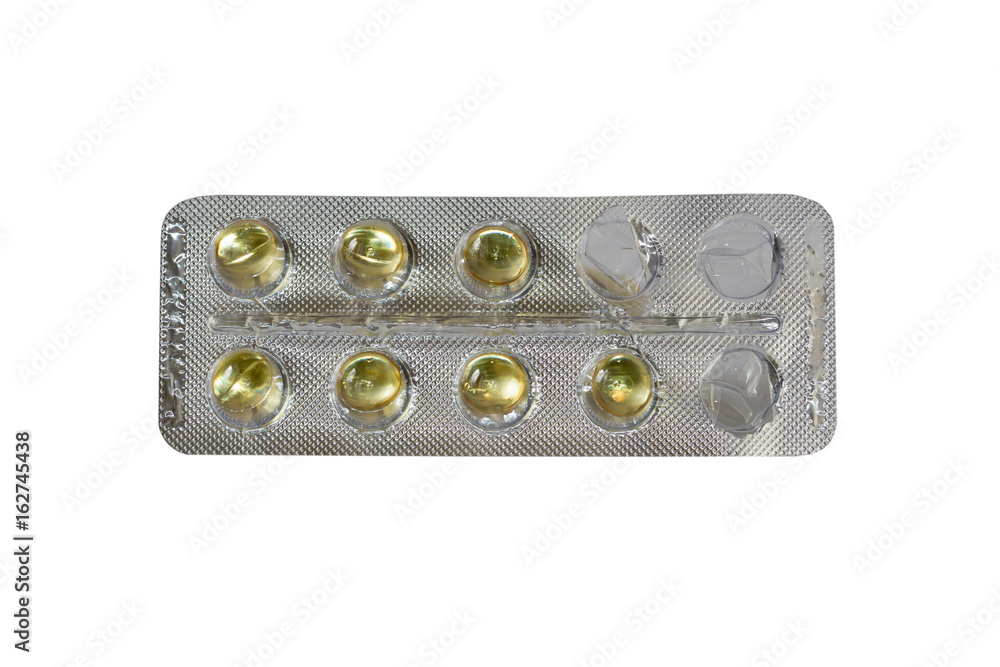 One started foil package with pills isolated on white background One started foil package with pills isolated on white background
