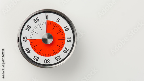 Vintage analog kitchen countdown timer, 45 minutes remaining