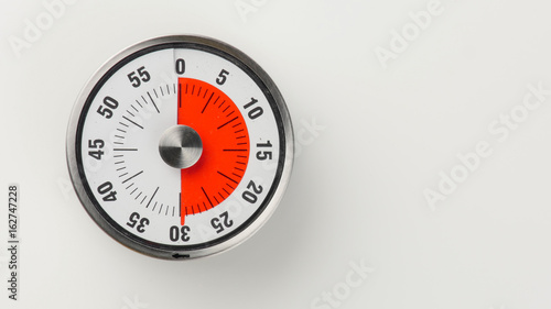 Vintage analog kitchen countdown timer, 30 minutes remaining