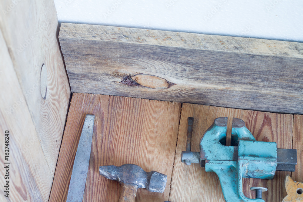 Carpentry tools on a wooden table top Carpentry tools on a wooden table top
