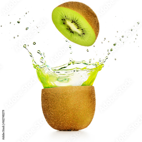 green juice exploding out of a kiwi 