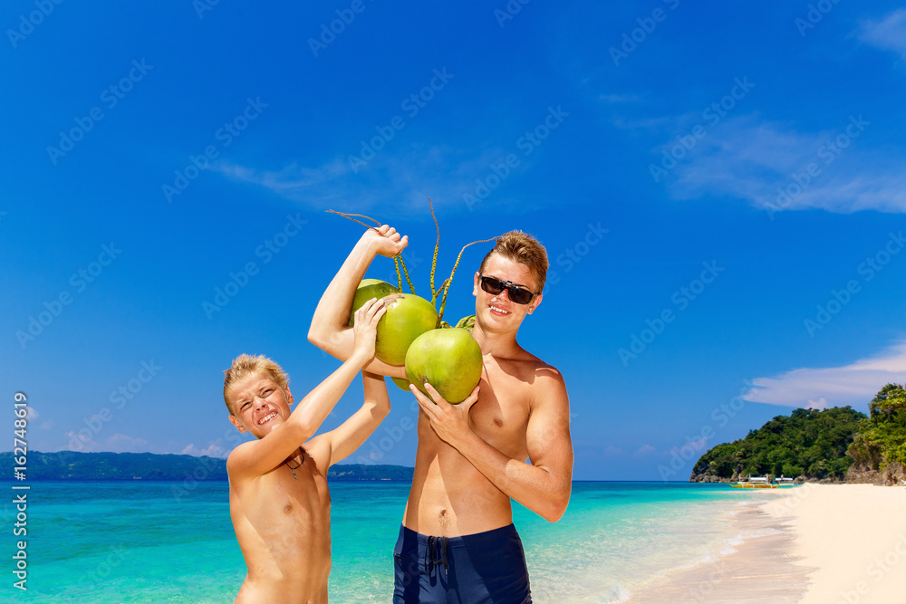 Playful boys enjoying the beach together, Stock Photo, Picture And Royalty  Free Image. Pic. BIM-BLD083548
