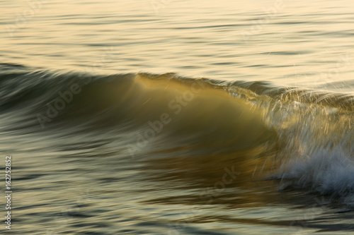 Waves on the ocean captured with a slow shutter speed to bring a sense of movement and power.