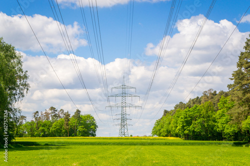 High voltage power lines at a sunny spring day