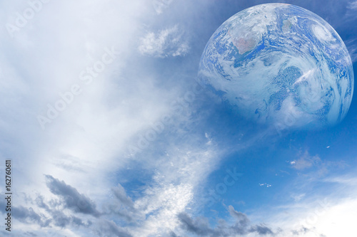 blue sky and cloud with earth . an element furnished by nasa