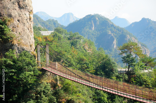 The suspension bridge at Fangdong Scenic Area in Yandangshan mountains located in Zhejiang province China.