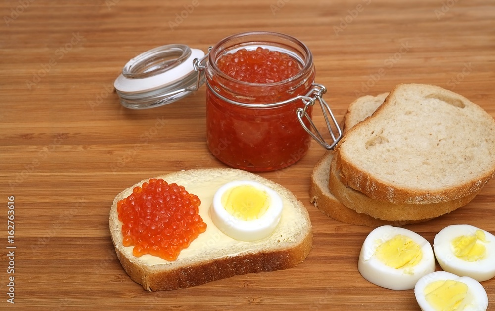 Sandwich with red caviar and egg in various angles Sandwich with red caviar and egg in various angles