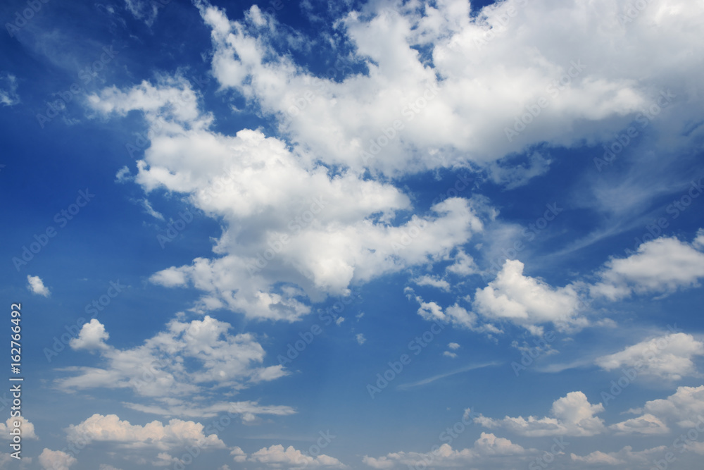 Cumulus white clouds on a blue sky background Cumulus white clouds on a blue sky background