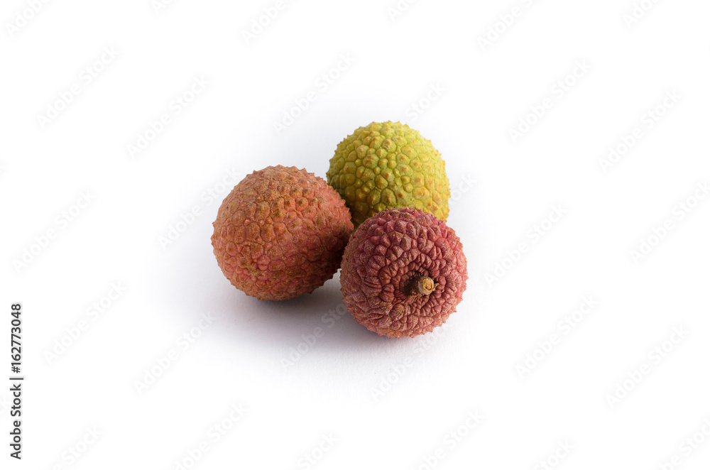 three lychee fruits isolated on white background three lychee fruits isolated on white background