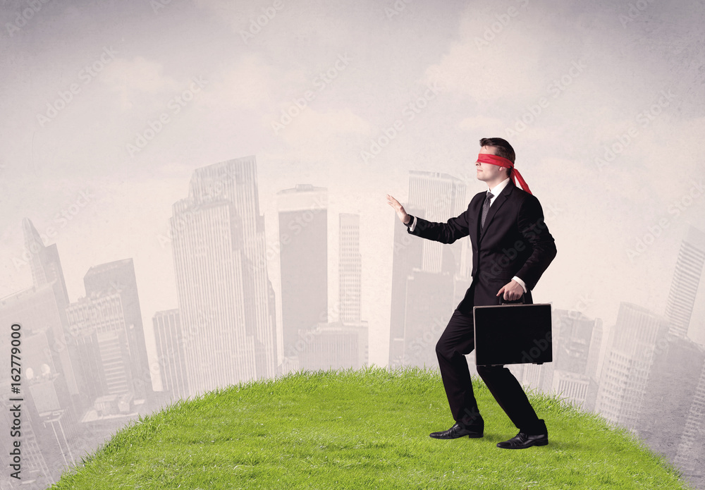 Blindfolded businessman concept Blindfolded businessman concept