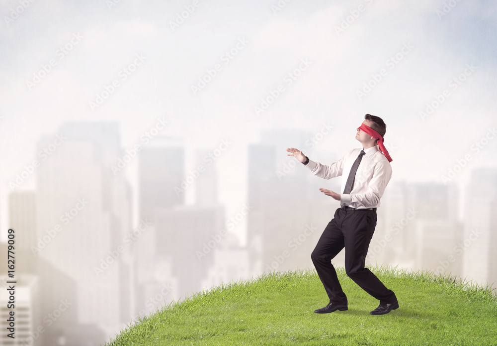 Blindfolded businessman concept Blindfolded businessman concept