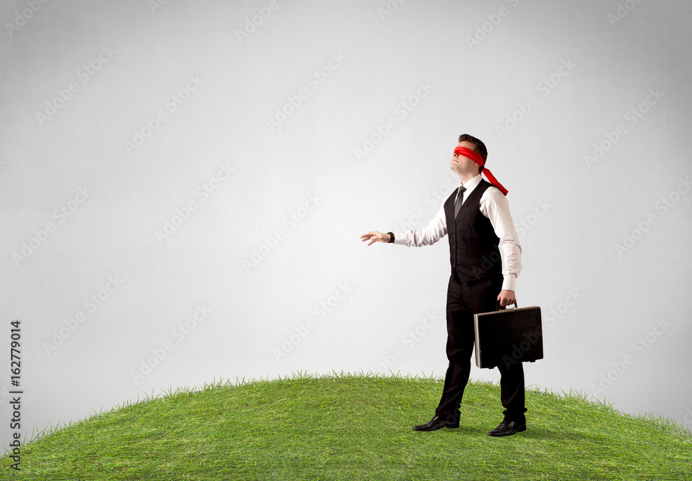 Blindfolded businessman concept Blindfolded businessman concept