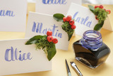 How to make wedding place name cards with handwritten letters and fresh plants