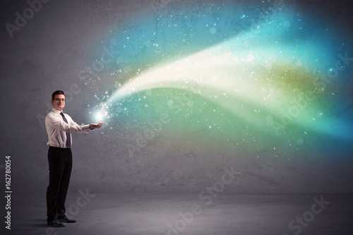 Wallpaper Mural Businessman holding light Torontodigital.ca