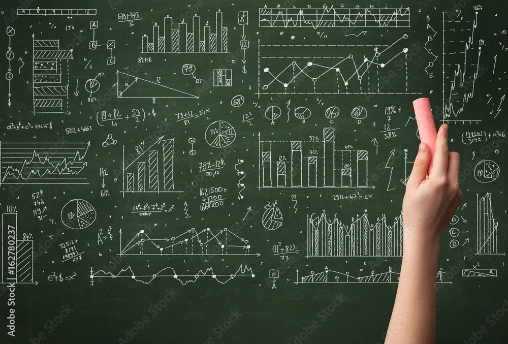 A business person drawing data on chalkboard A business person drawing data on chalkboard