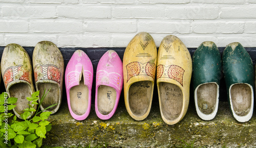 Wooden shoes against a Wall