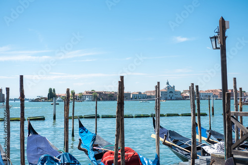 Gondola, Saint Mark square with San Giorgio di Maggiore church on background in Venice, Italy. © moomusician