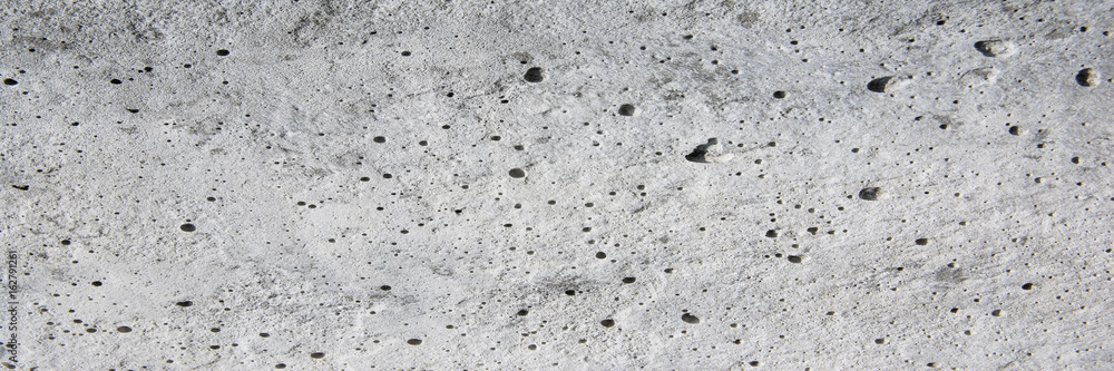 Fototapeta premium grey concrete wall.Panorama bubbles concrete background
