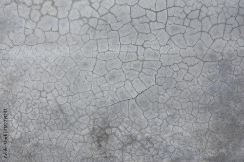 grey concrete wall.cracked concrete background