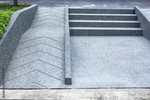 ramp for the wheelchair and stairs for normal people adjoining