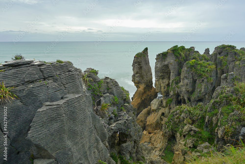 Punakaiki rocks on the ocean coast in New Zealand Punakaiki rocks on the ocean coast in New Zealand